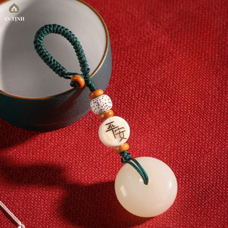 Móc khóa phong thủy bình an ngọc bích tròn