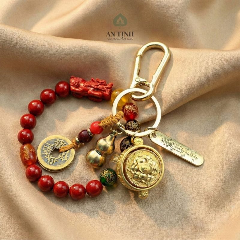 Combo Vòng Tay Chu Sa + Móc Khóa Bát Tụ Bảo Xoay